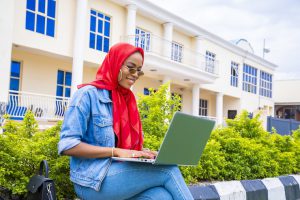 vocational school grad working remotely on a laptop